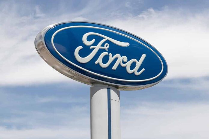 2154283459 featured image Blue Ford logo sign against the sky.