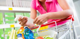 Person shopping for groceries in store.