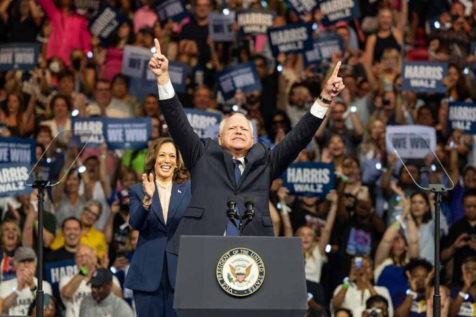 2499464705 featured image Politicians at a rally, crowd in the background cheering.