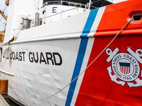 U.S. Coast Guard ship docked at port.