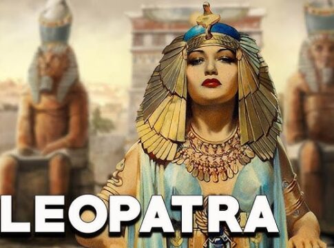 Artistic depiction of Cleopatra with Egyptian statues in the background