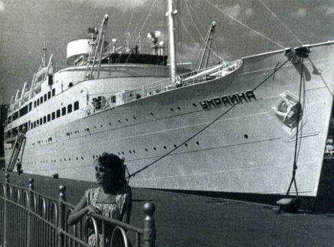 shutterstock245611717jpg A large ship named Ukraine docked at a pier.
