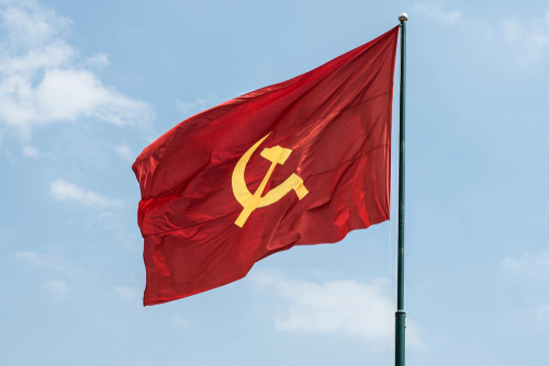 Red flag with yellow hammer and sickle symbol.