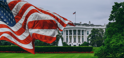 shutterstock_1062500954 (1).jpg featured image U.S. flag waving in front of the White House.
