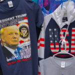 Trump T-shirt and USA hoodie display in store.