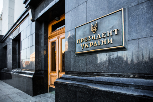 Exterior view of the Ukrainian presidential building with a sign