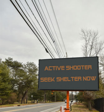 Electronic traffic sign warning of active shooter