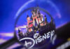 Disney castle logo under a magnifying glass.