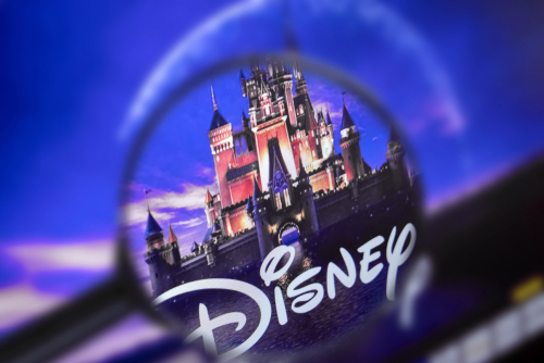 shutterstock_1341385184 (4).jpg featured image Disney castle logo magnified under a lens.