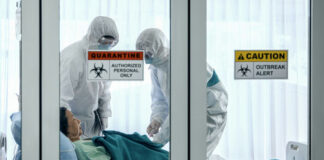 Patients and healthcare workers inside a quarantine zone.