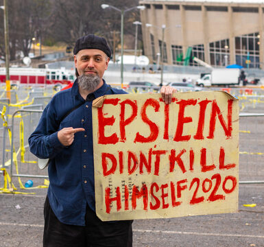 Man holding sign
