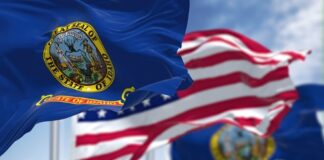 Idaho and U.S. flags waving in the wind.