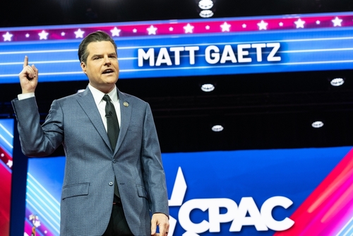 shutterstock_2270303491.jpg featured image Matt Gaetz speaking at CPAC in front of sign.