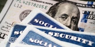 Social Security cards and U.S. one hundred dollar bill.