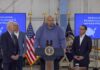 I dont know who these people are. Four men give a presentation.