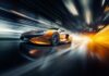 Orange sports car speeding through a futuristic tunnel.