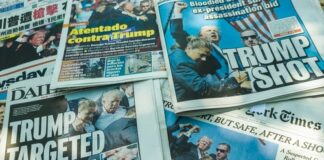 Newspaper headlines about an assassination attempt on Donald Trump.