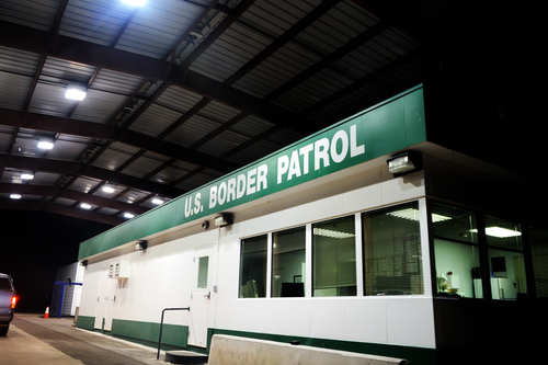 shutterstock_43250812.jpg featured image U.S. Border Patrol building at night.