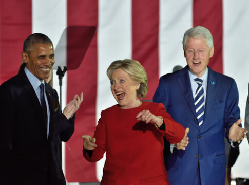 Barack Obama, Hillary Clinton, Bill Clinton at an event.