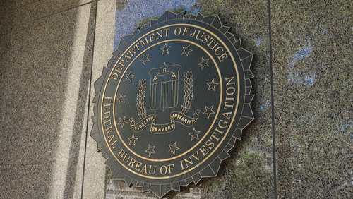 shutterstock_657572659.jpg featured image FBI seal on a building exterior wall.